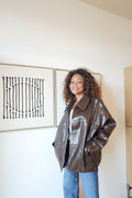brown patent-effect jacket