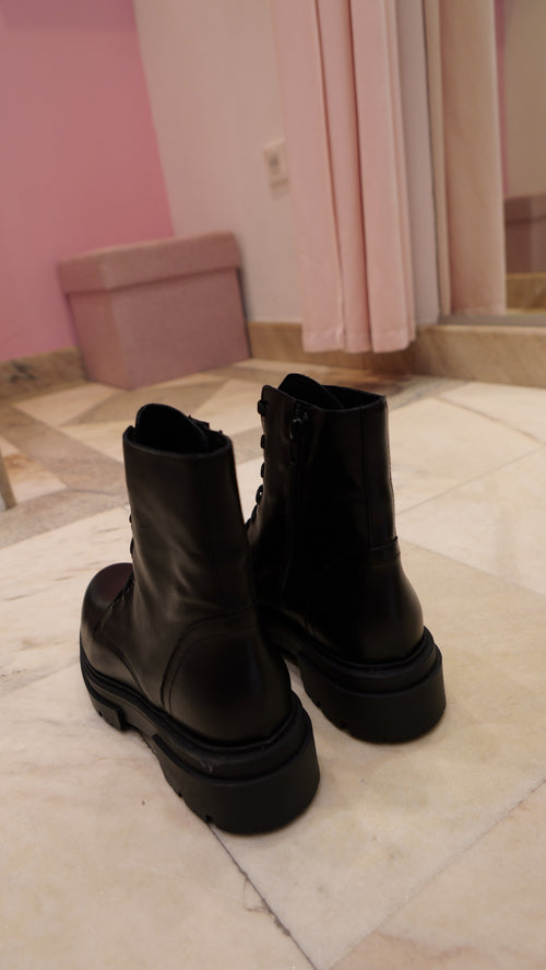 Black leather lace-up ankle boots