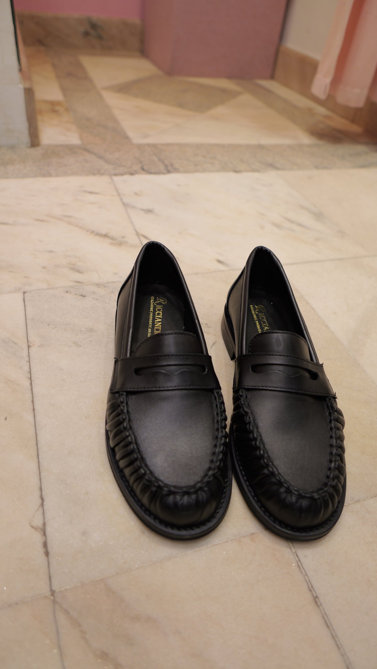 Black leather loafers