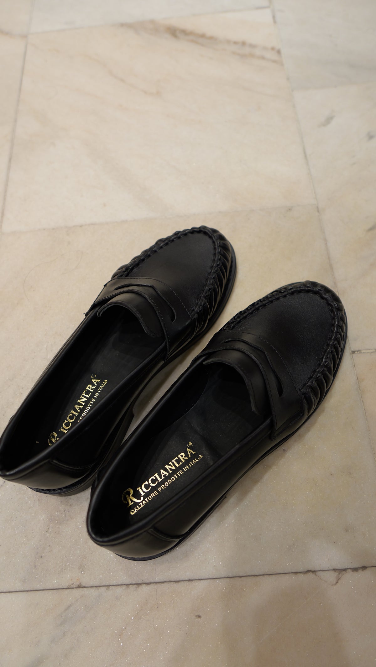 Black leather loafers