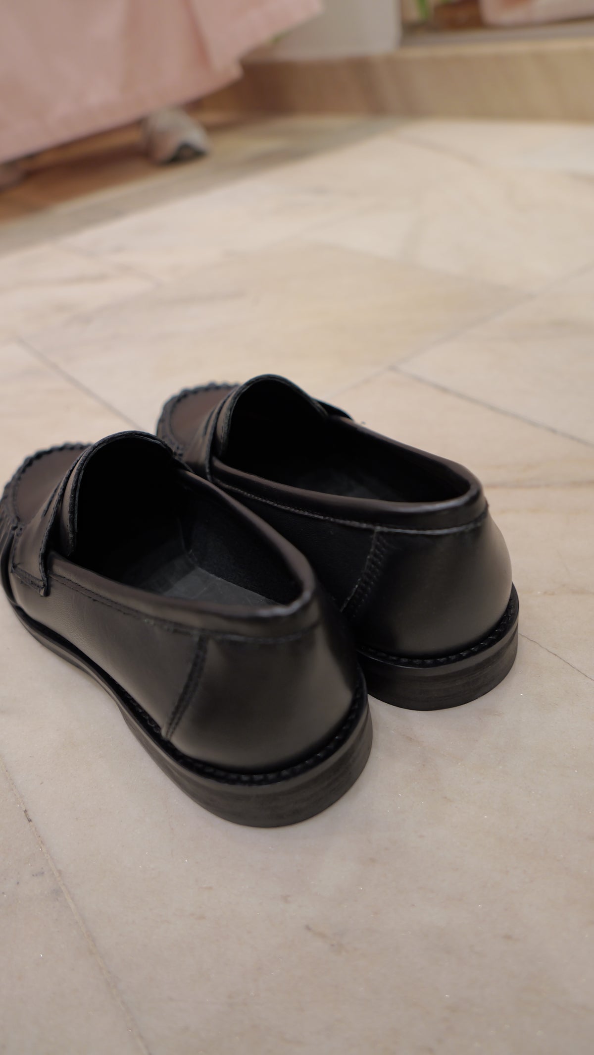 Black leather loafers