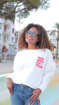 White "More Amor Por Favor" sweatshirt in red