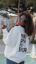 "More Amor Por Favor" white sweatshirt, chocolate