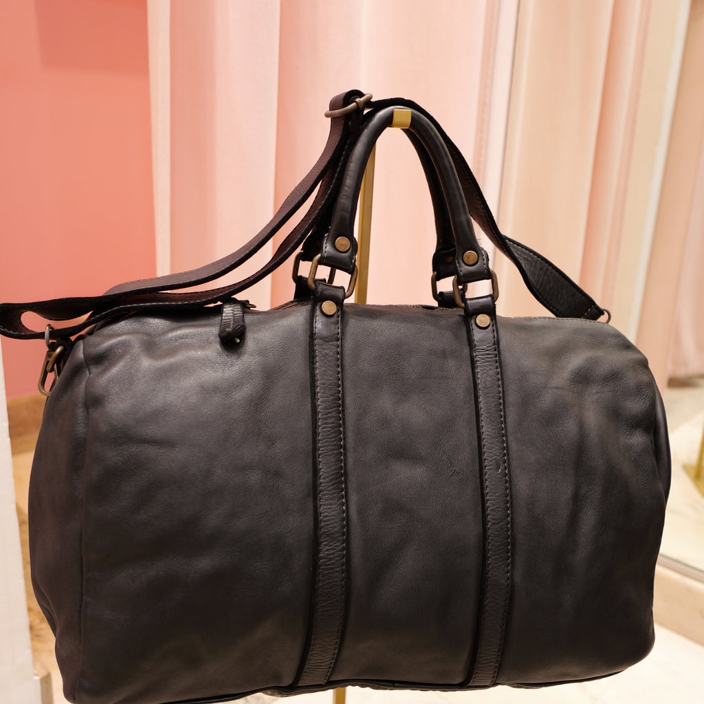 Black vintage leather travel bag