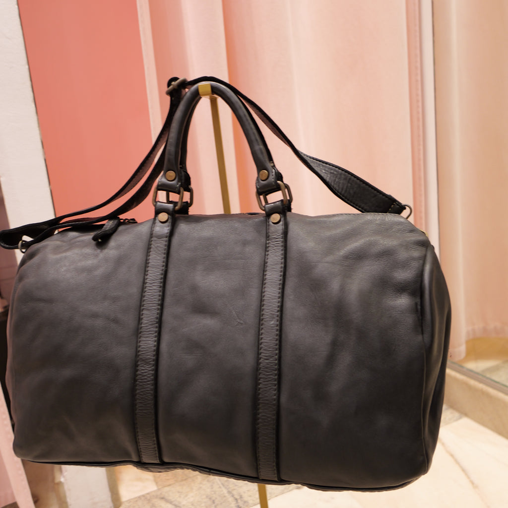 Black vintage leather travel bag