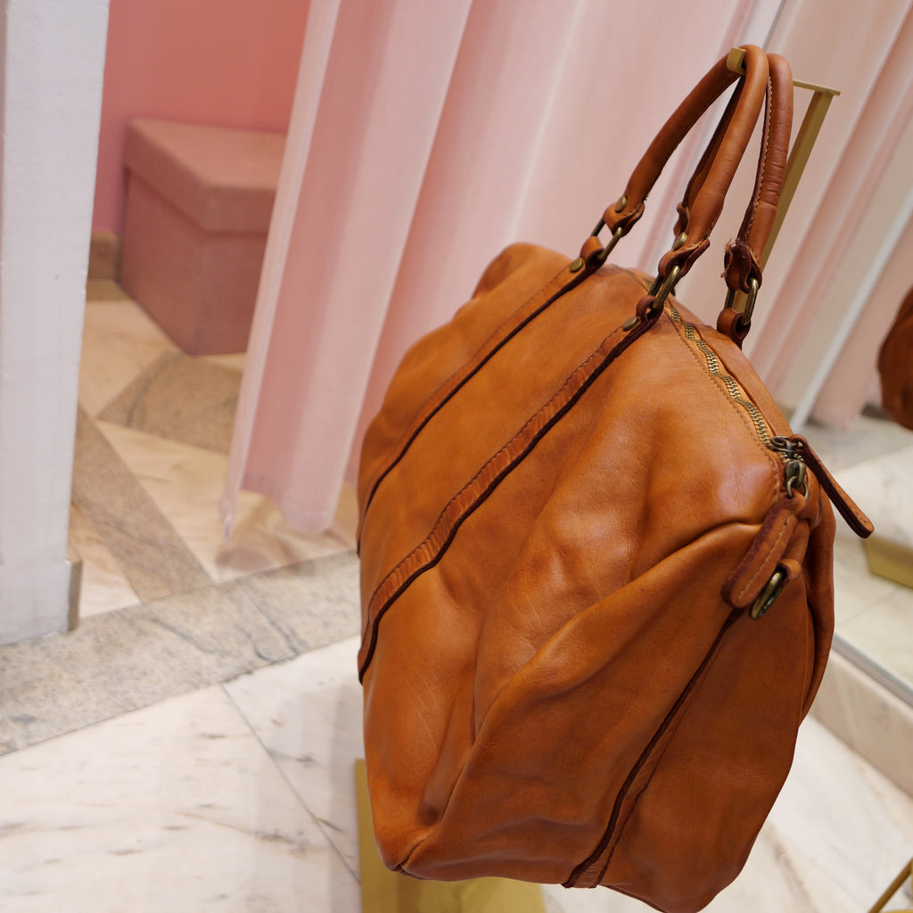 Vintage camel leather travel bag