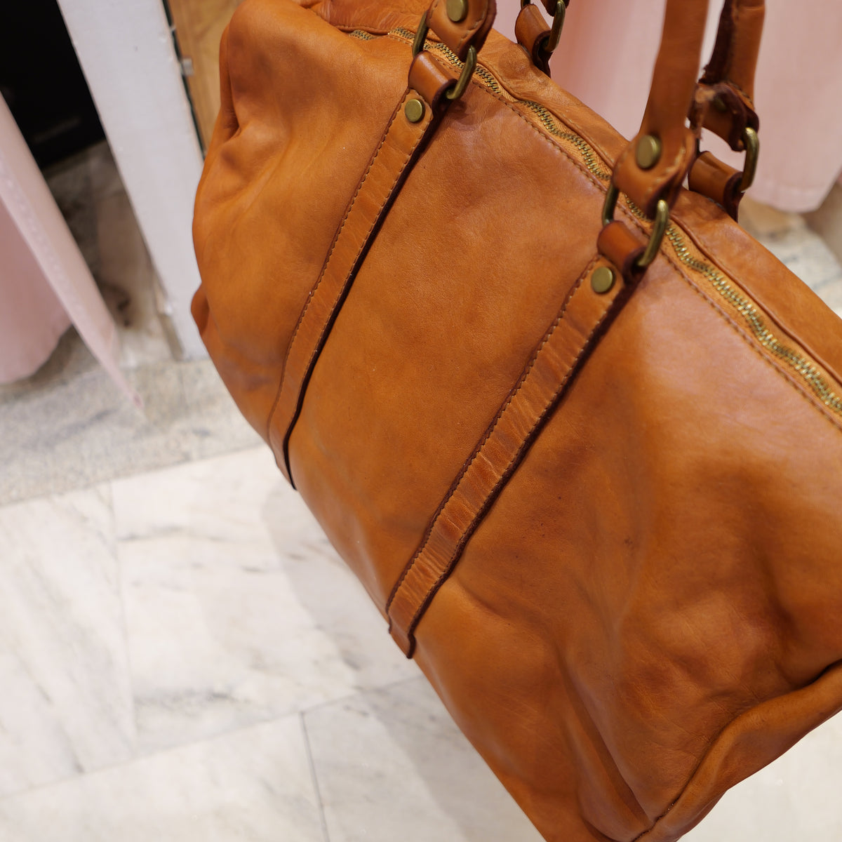 Vintage camel leather travel bag