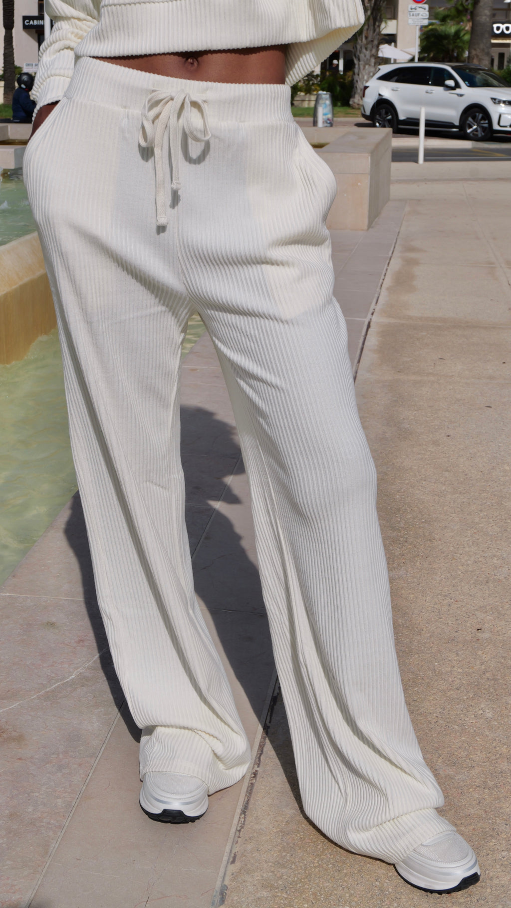 Ecru corduroy-effect wide-leg trousers